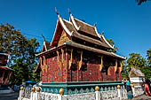 Wat Xieng Thong temple in Luang Prabang, Laos.  La Chapelle Rouge , the Red Chapel. It contains an especially rare reclining Buddha. 